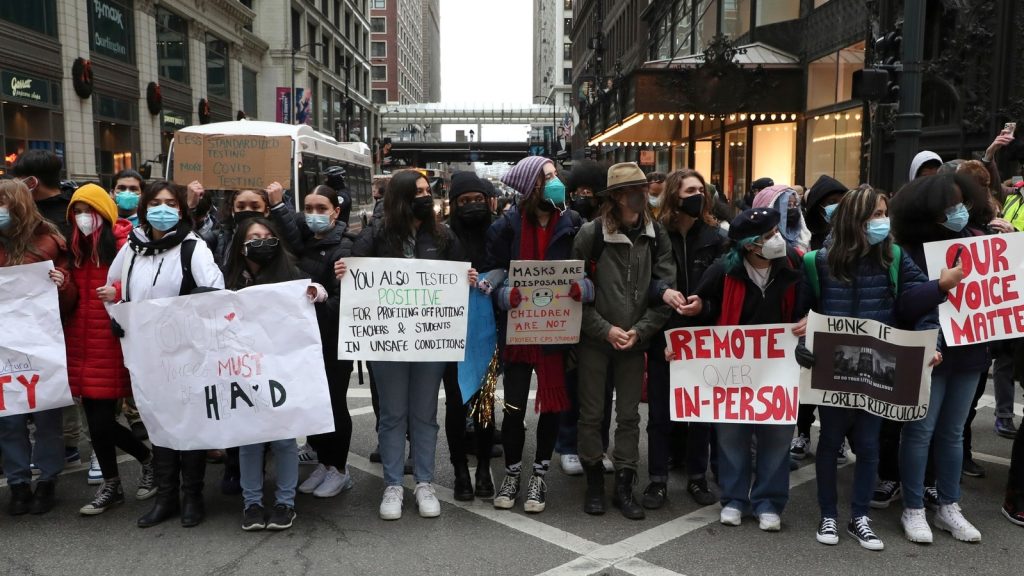 As Omicron fuels surge, U.S. students stage walkouts to protest in-person classes