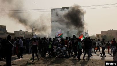 Protesters take to Sudan’s streets again, decrying coup and arrests