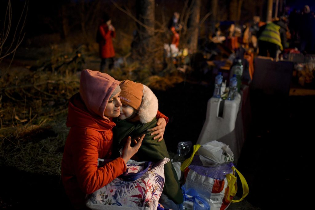 Ukrainians flee war, seeking safety across western borders