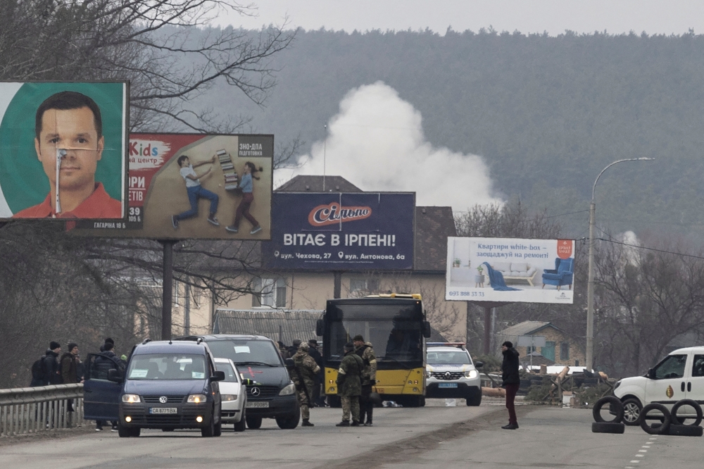 Kyiv digs in for battle as fighting flares in areas nearby